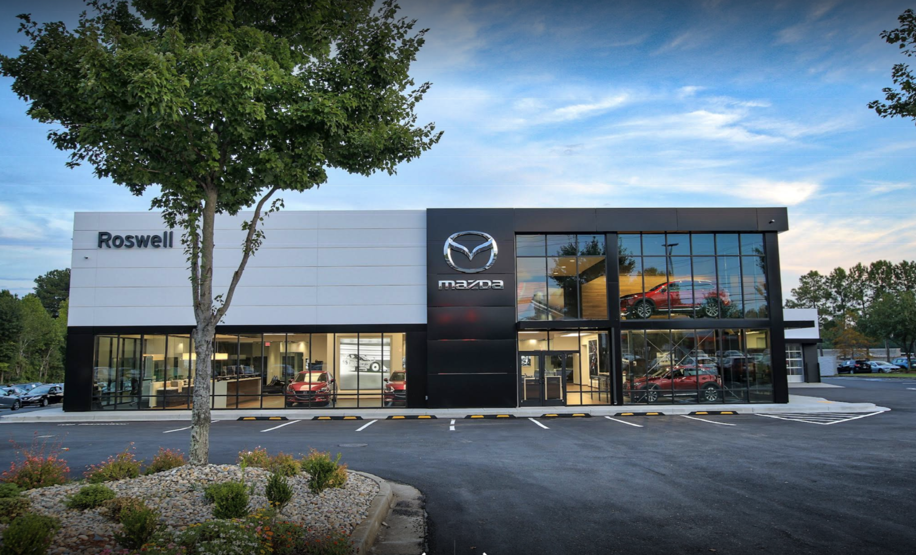 SUV parked in a modern, sunlit space