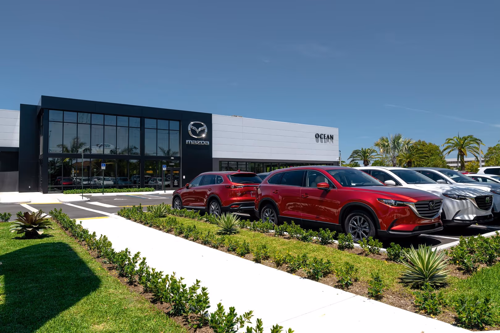 SUV parked in a modern, sunlit space