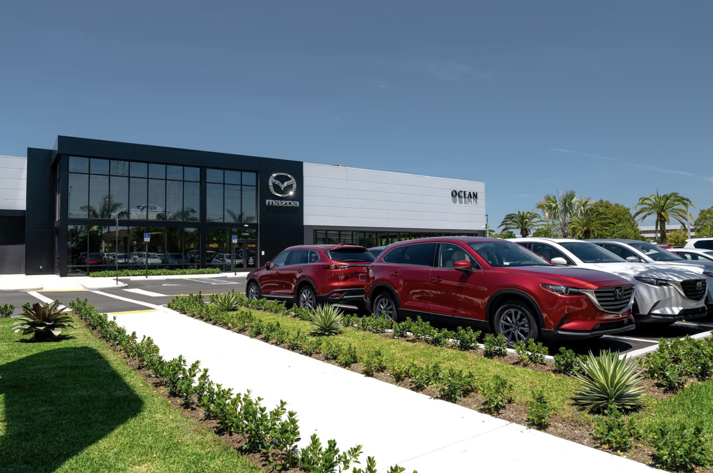 SUV parked in a modern, sunlit space